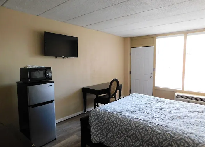 Apm Inn And Suites