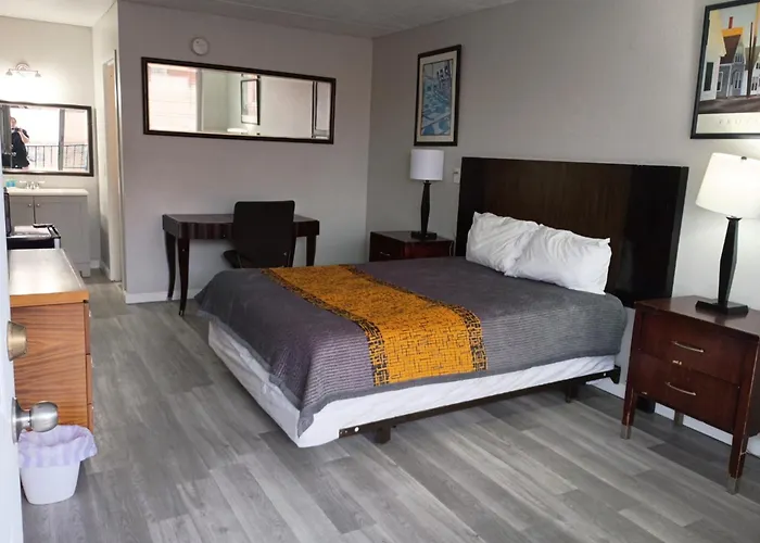 Apm Inn And Suites